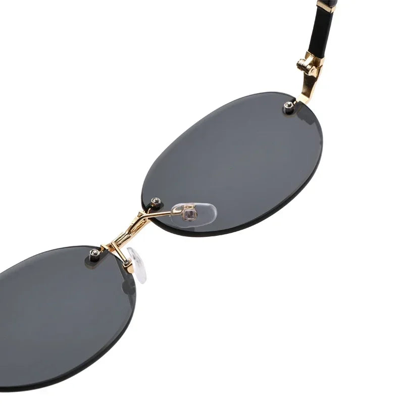 Popular Women Shades Oval Sun Glasses for Female Male Summer Glasses UV400 Rimless Sun Glasses Round Fashion Gafas De Sol Очки